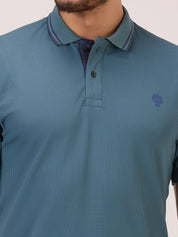 golf polo t shirt for men in royal green self check close up view