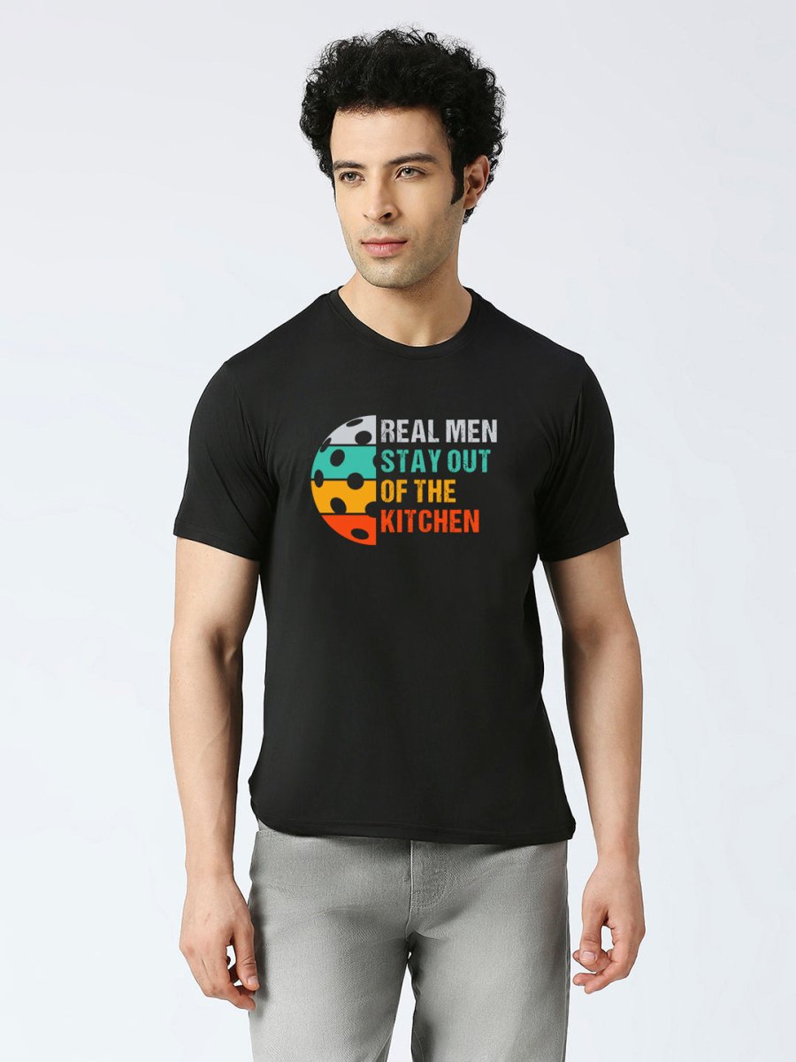 Black dry fit t-shirt with "Real Men Stay Out Of The Kitchen" quote