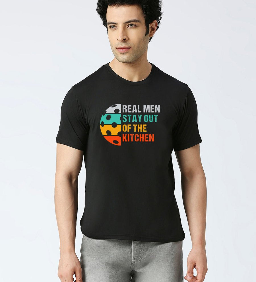 Black dry fit t-shirt with "Real Men Stay Out Of The Kitchen" quote
